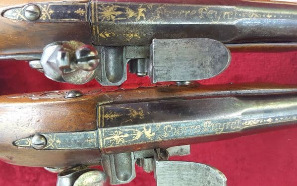 Pair of 18th C. French silver Mounted flintlock Pistols by Peyret of Paris. Ref 9279